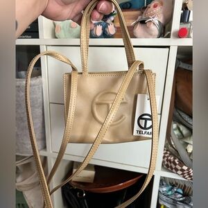 Telfar Small Shopping Bag in the color Cream